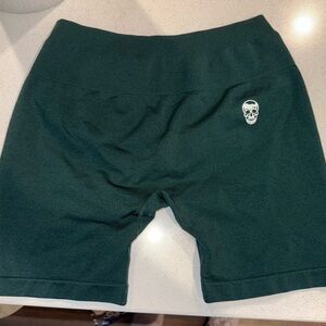 Green Shorts with Skull Emblem